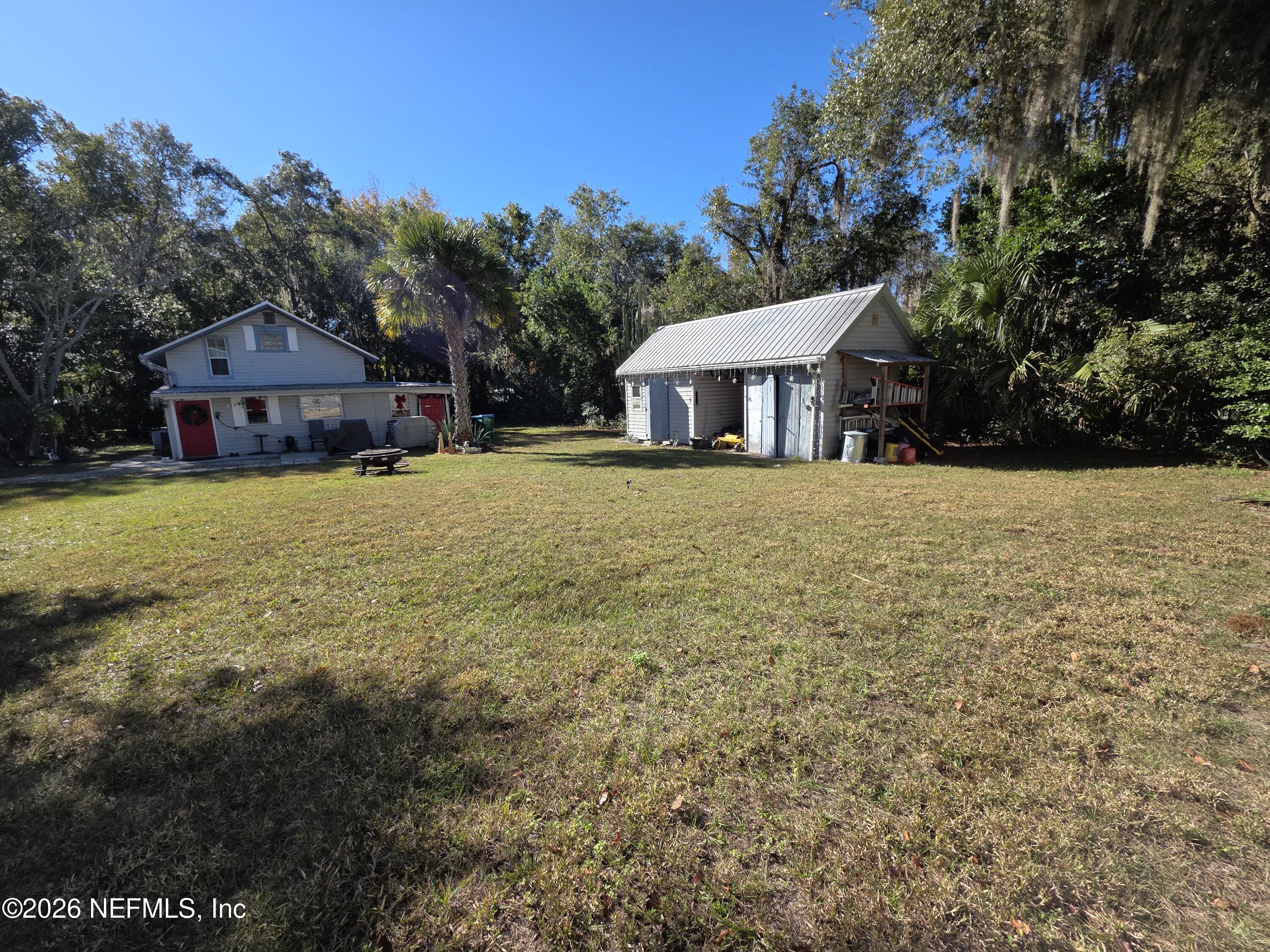 508 Edgewood Avenue Crescent City, FL 32112 - Photo 44 of 71 a front view of a house with a yard