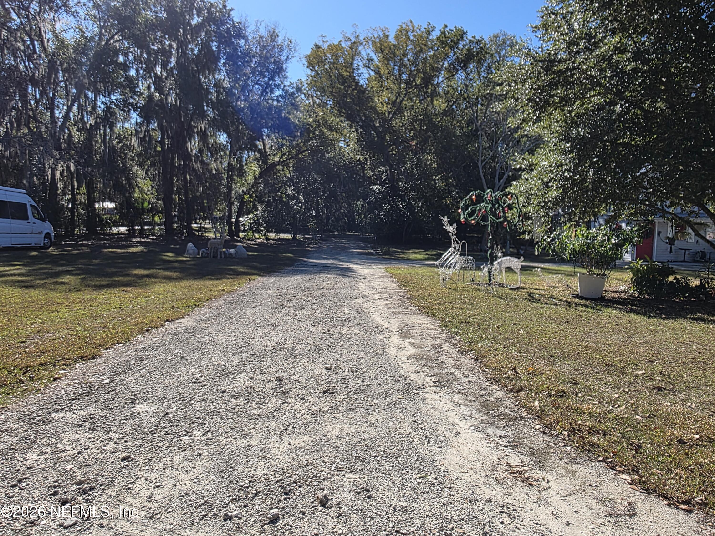 508 Edgewood Avenue Crescent City, FL 32112 - Photo 60 of 71 a view of a yard with trees