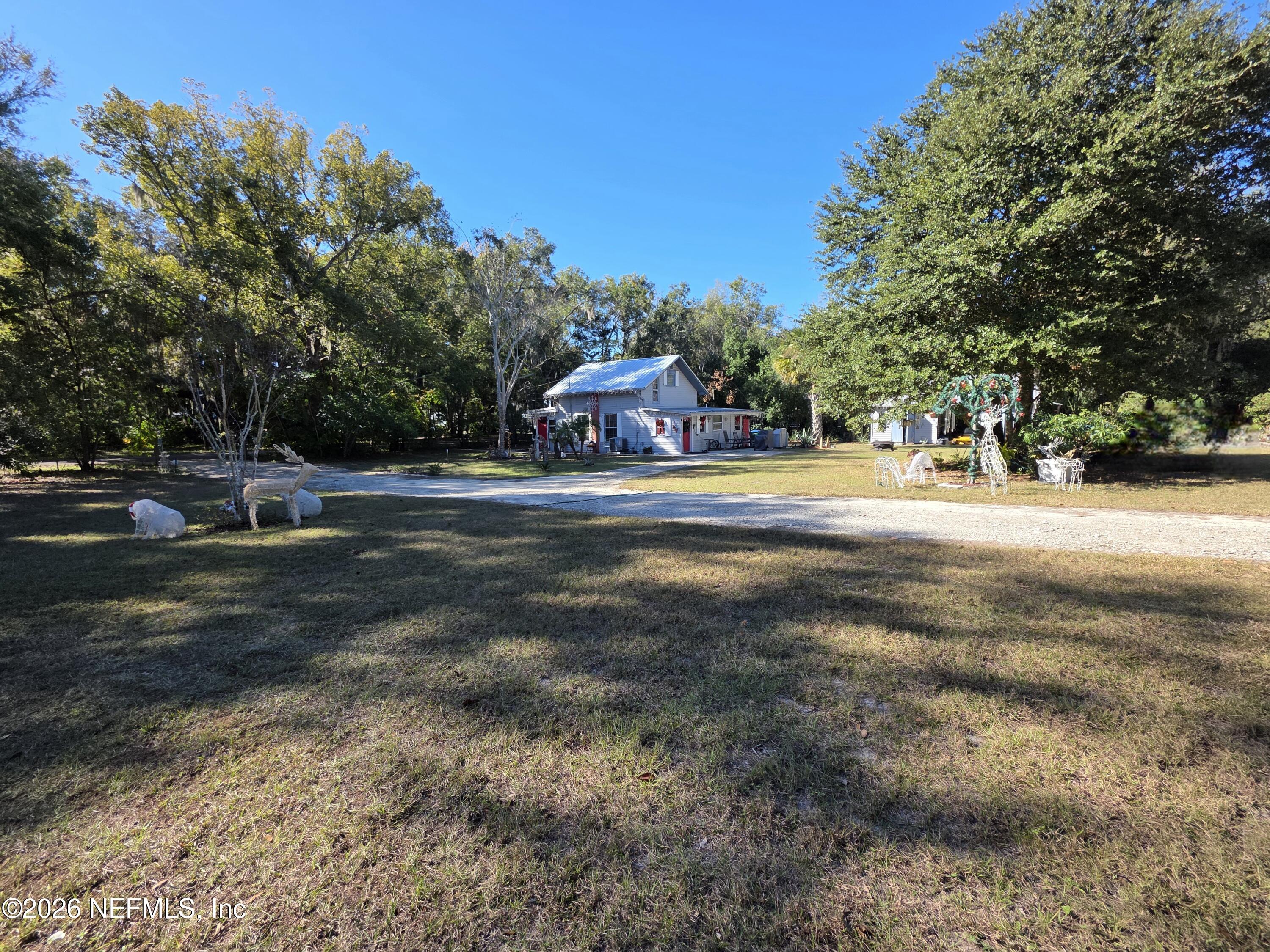 508 Edgewood Avenue Crescent City, FL 32112 - Photo 70 of 71 a front view of a house with a yard