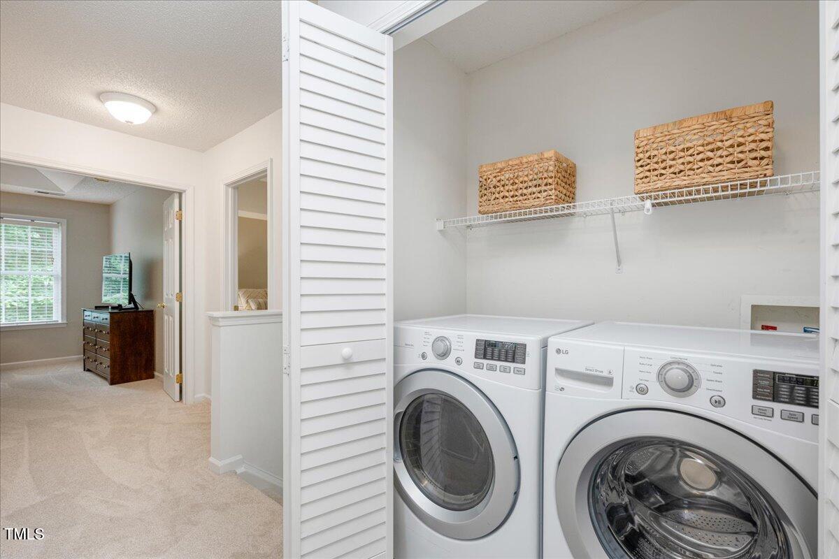 4524 Drewbridge Way Raleigh, NC 27604 - Photo 19 of 29 a view of livingroom with washer and dryer