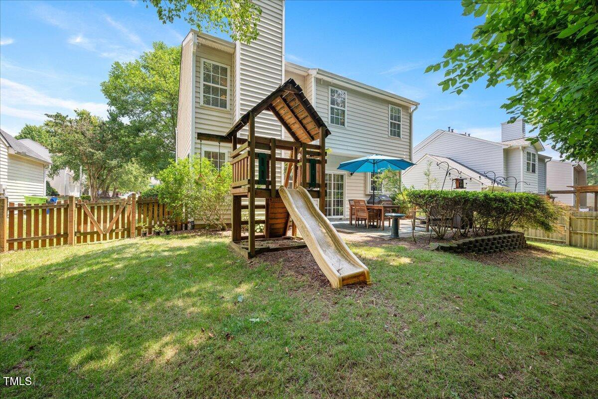 4524 Drewbridge Way Raleigh, NC 27604 - Photo 23 of 29 a view of a house with a park