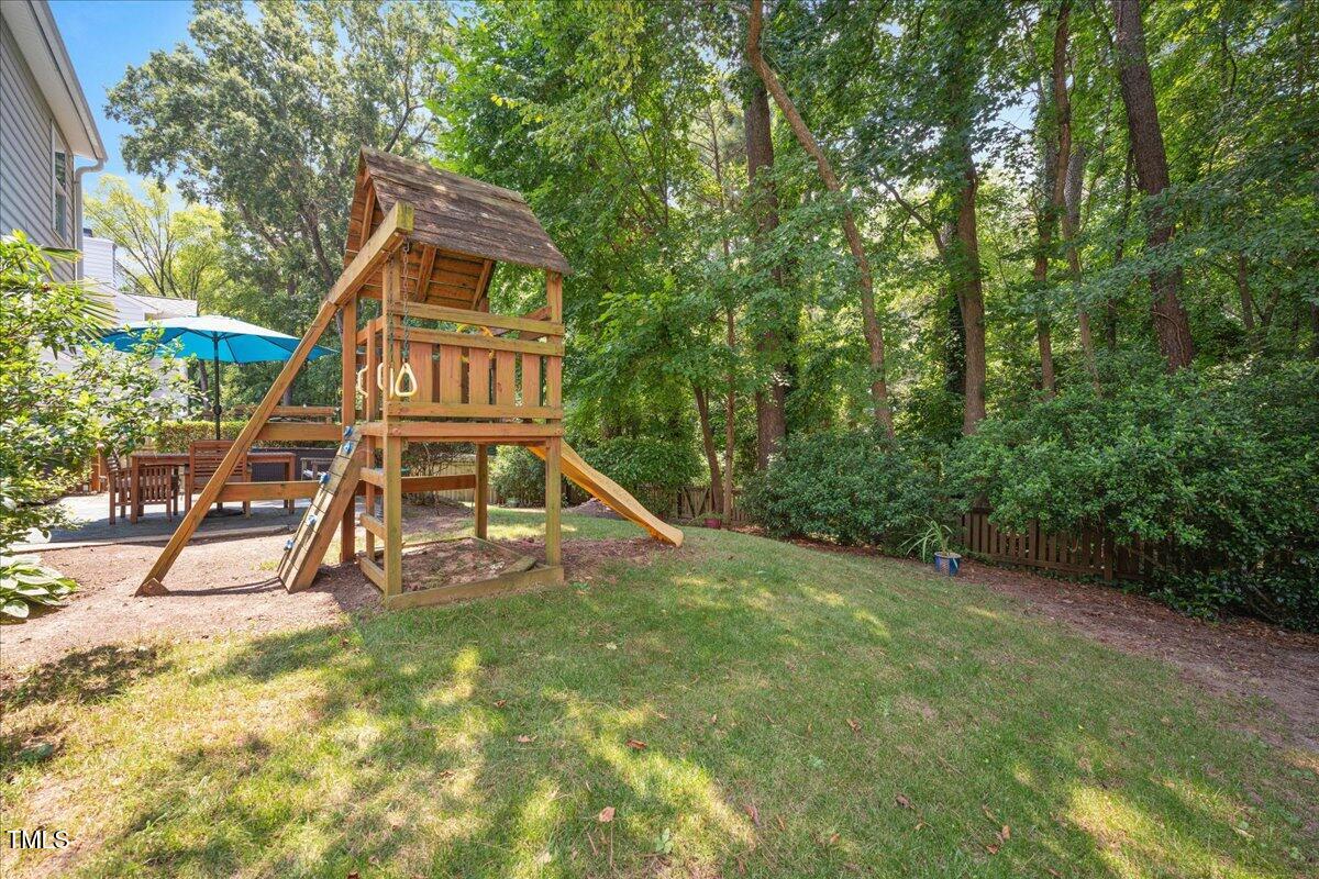 4524 Drewbridge Way Raleigh, NC 27604 - Photo 26 of 29 a view of a park with slide