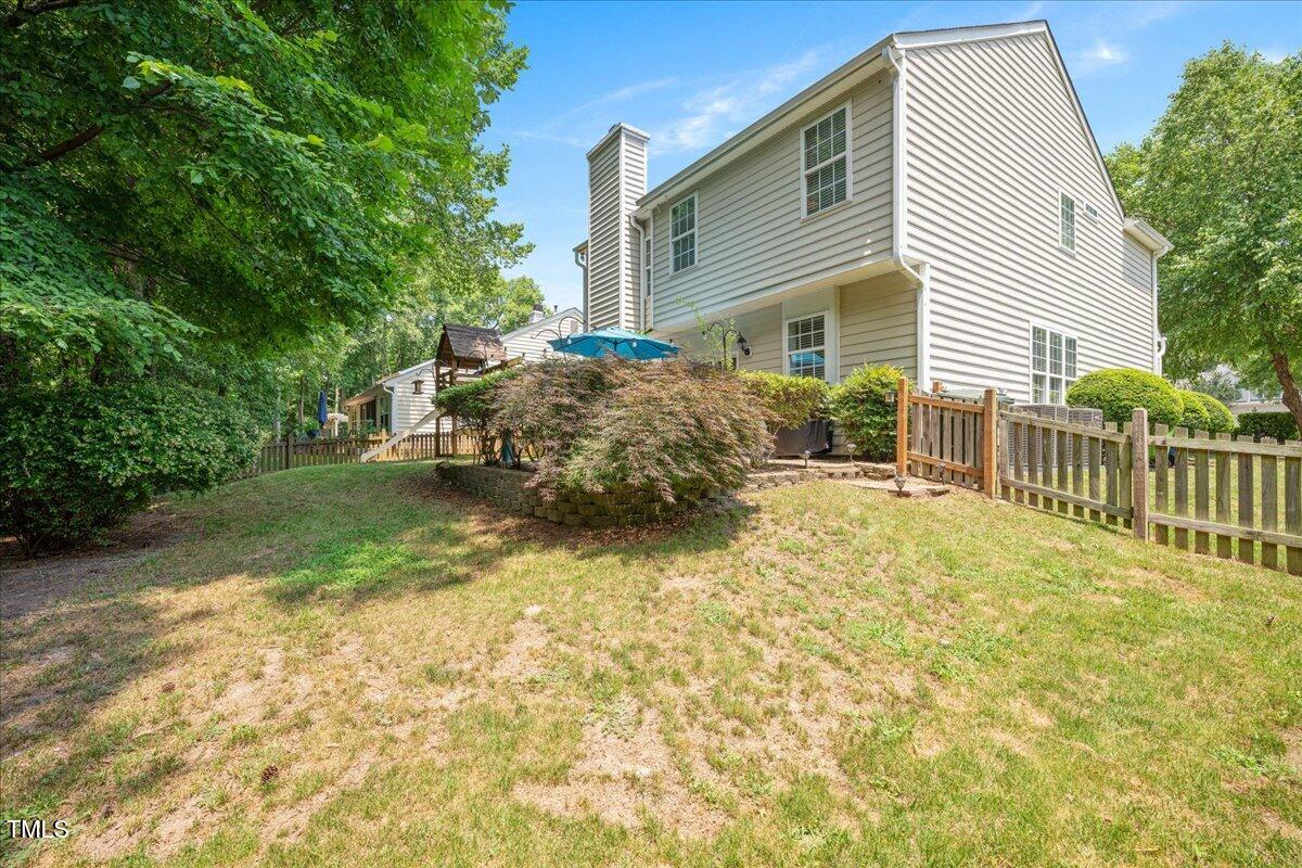 4524 Drewbridge Way Raleigh, NC 27604 - Photo 27 of 29 a backyard of a house
