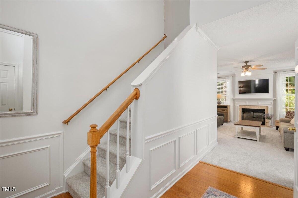 4524 Drewbridge Way Raleigh, NC 27604 - Photo 3 of 29 a view of a livingroom with furniture staircase and a living room