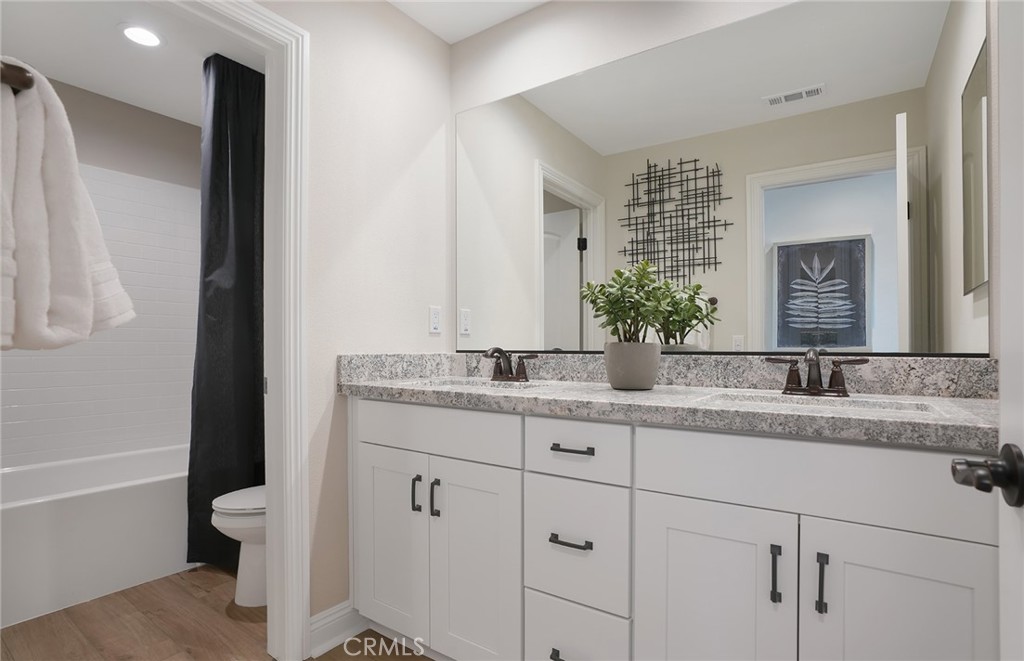 814 Divot Court Perris, CA 92571 - Photo 18 of 21 Photos uploaded are of the model representing the floor plan and are to demonstrate furniture layout. Furniture pictured is for demonstration only and not included with purchase.