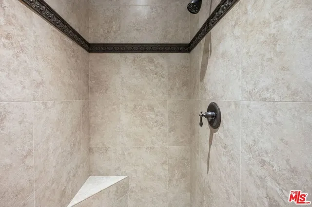 a view of a kitchen with a large window