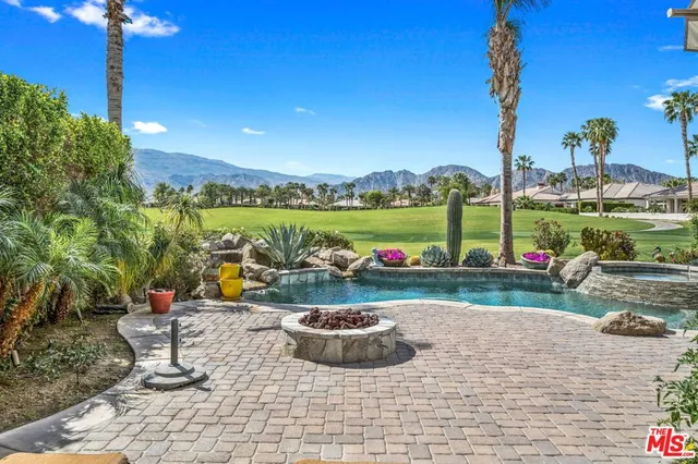 a view of a town with an ocean view