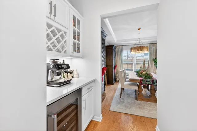 a bathroom with a sink and cabinets