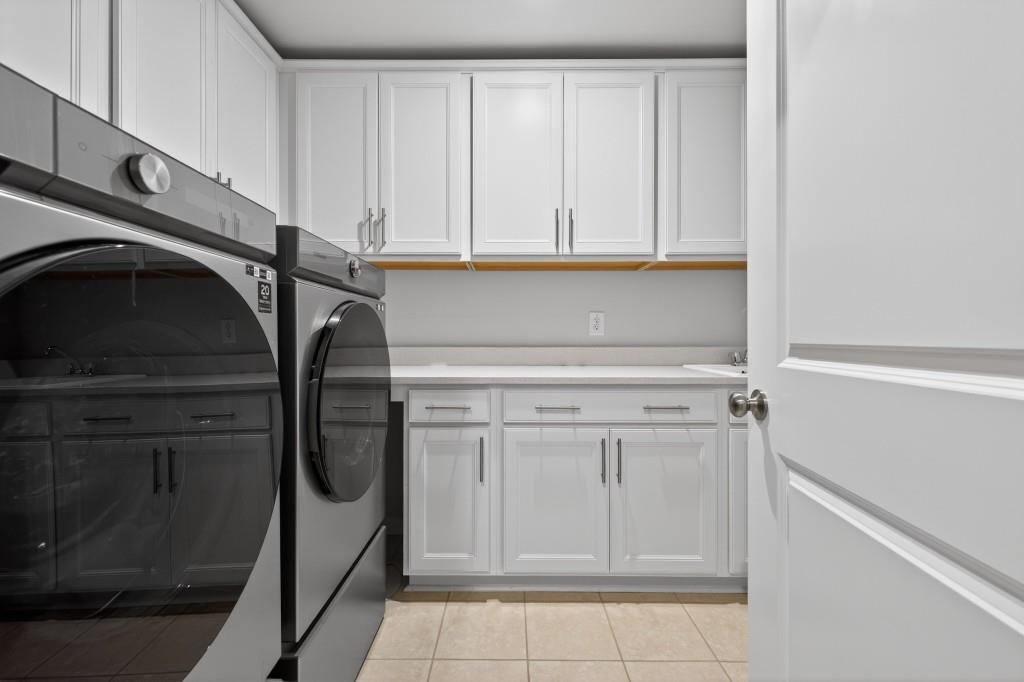 7277 Maple Brook Lane Flowery Branch, GA 30542 - Photo 56 of 93 a close view of utility and utility room