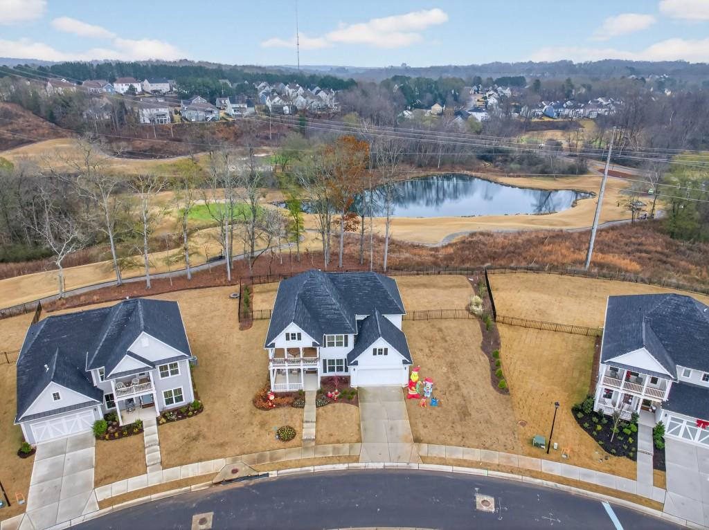 7277 Maple Brook Lane Flowery Branch, GA 30542 - Photo 80 of 93 an aerial view of residential houses with outdoor space