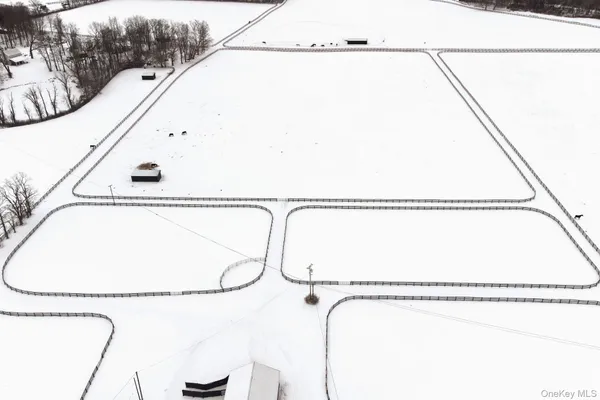 a close up view of a vanity and a shower in a bathroom