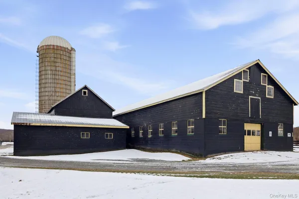 a front view of a house with yard