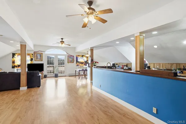 a view of a living room and dining room