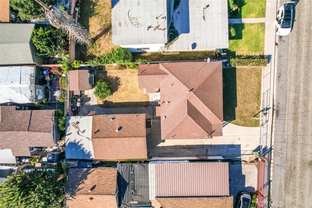 814 West Maple Street Compton, CA 90220 - Photo 2 of 13 an aerial view of residential houses with outdoor space