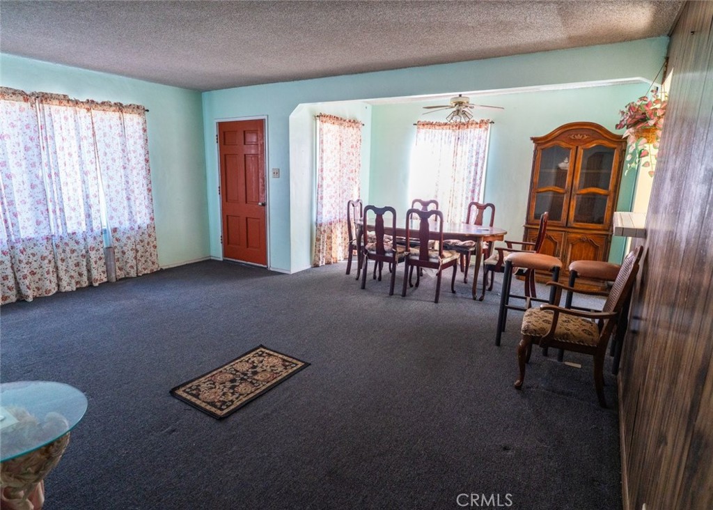 814 West Maple Street Compton, CA 90220 - Photo 8 of 13 a view of a livingroom with furniture and window