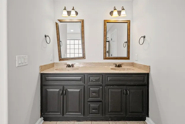 a sink with a mirror