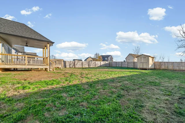 a view of a house with a big yard