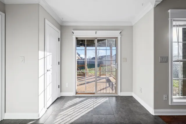 an empty room with windows