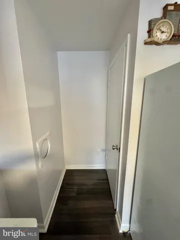 a view of a storage & utility room with a sink