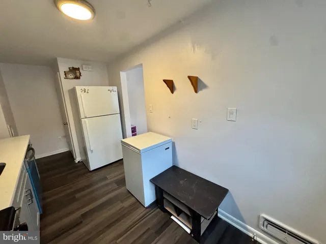 a kitchen with a stove and a microwave