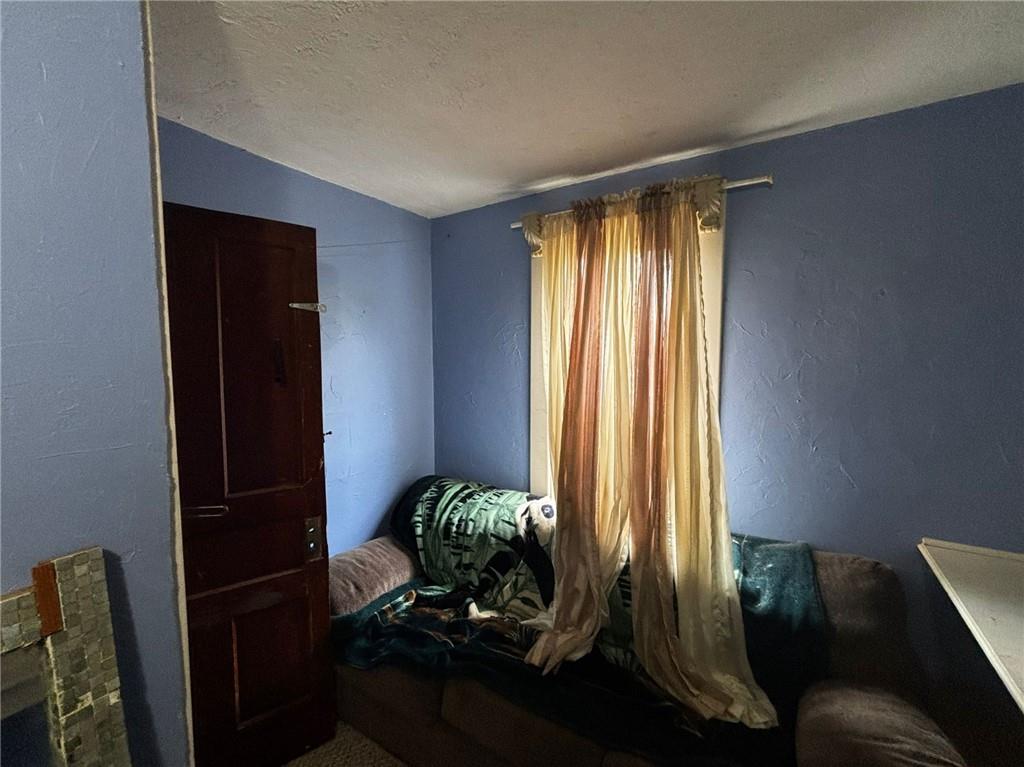 135 Hamilton Avenue Vandergrift, PA 15690 - Photo 11 of 25 a room with window and furniture