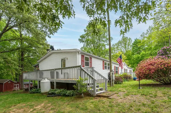 a view of a yard in front of house