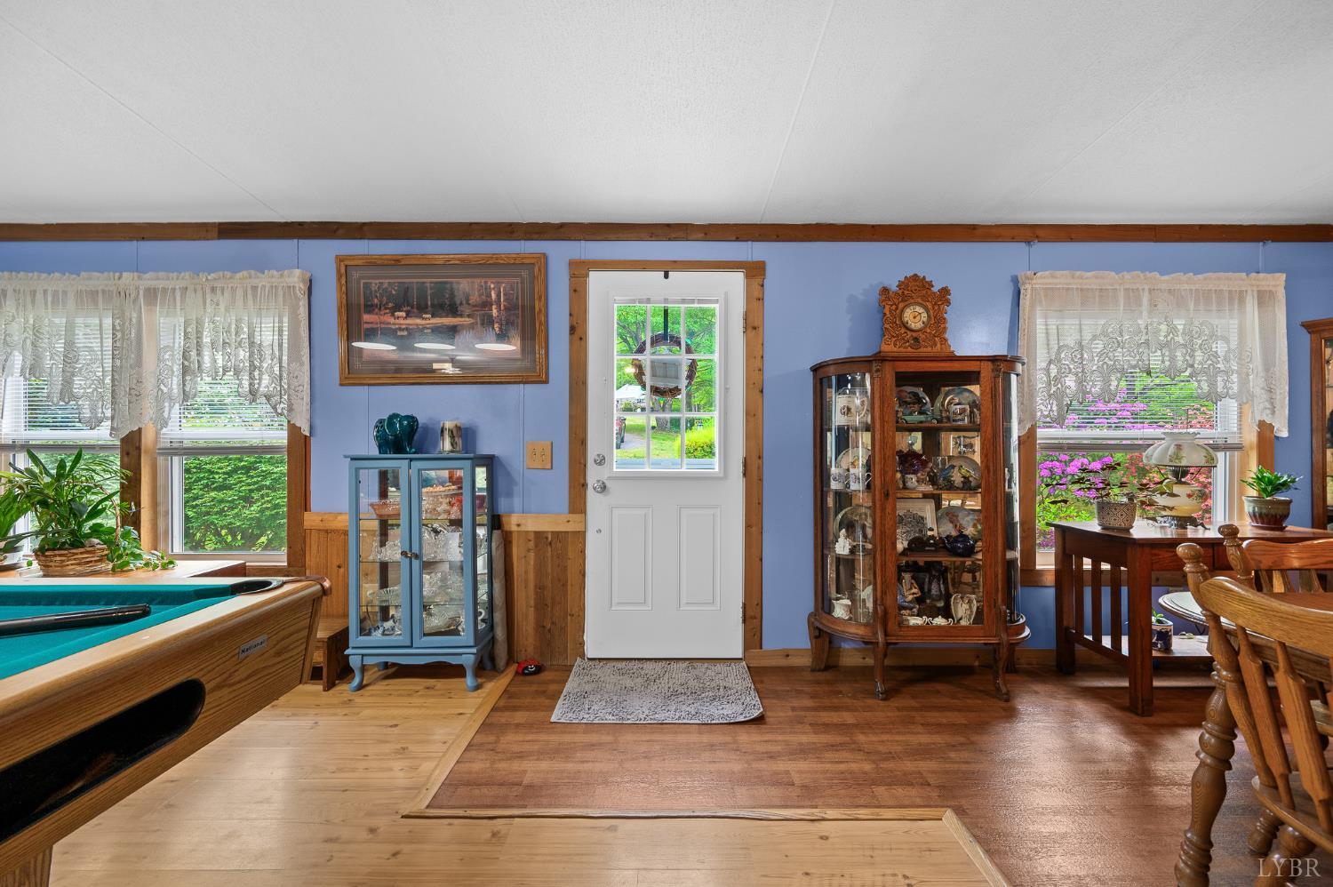 142 Micklem Lane Shipman, VA 22971 - Photo 6 of 38 a living room with furniture a window and bookshelf