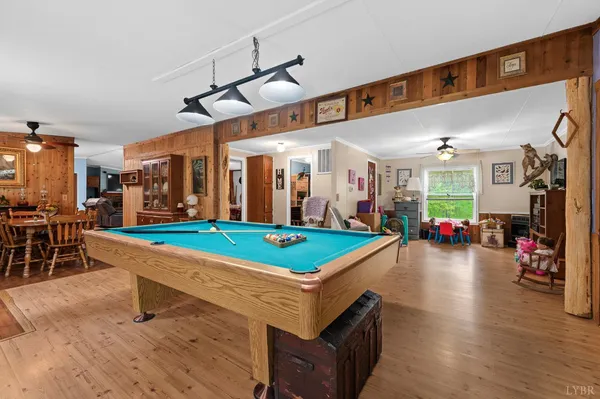 a room with lots of table and chairs