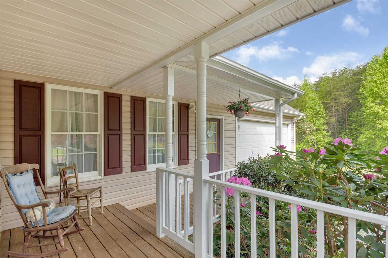 116 Valley View Road Ruckersville, VA 22968 - Photo 5 of 30 a porch with a bench