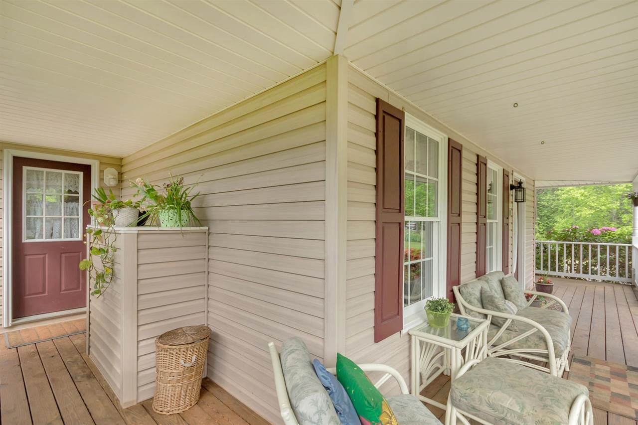 116 Valley View Road Ruckersville, VA 22968 - Photo 6 of 30 a porch with seating space
