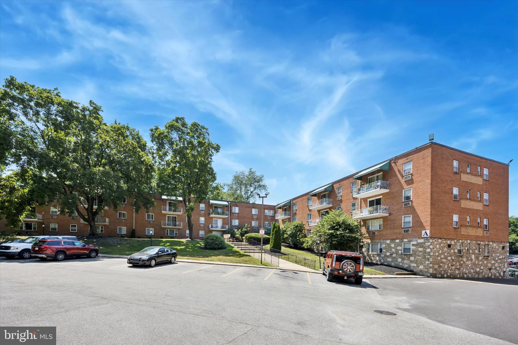 1600 Church Road, Unit A306 Wyncote, PA 19095 - Photo 2 of 15 a view of a street with cars