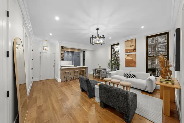 a bedroom with a large bed and a large window