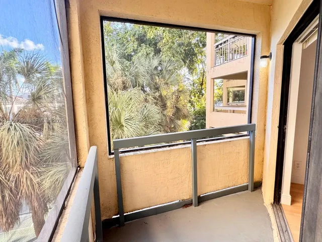 a view of a large window with an outdoor view