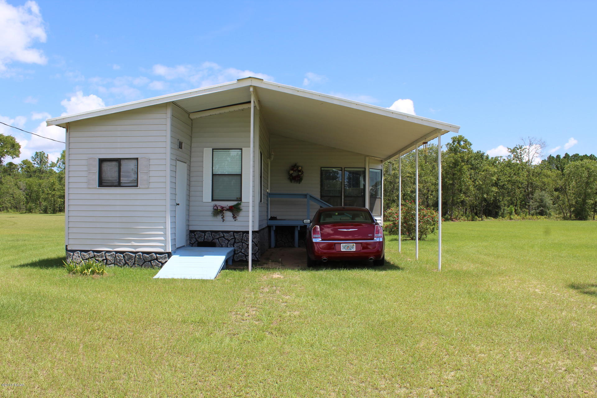 21450 Northwest Sandy Acres Road Altha, FL 32421 - Photo 2 of 25 Gallery Image 2