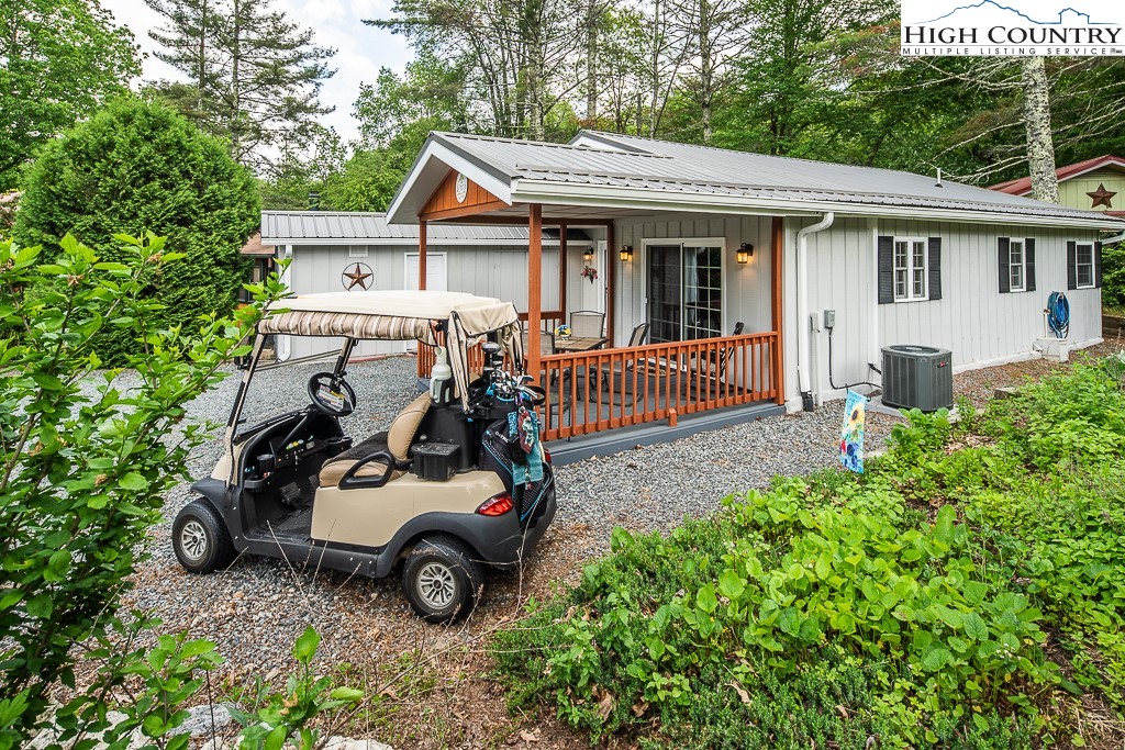 a car parked in front of a house