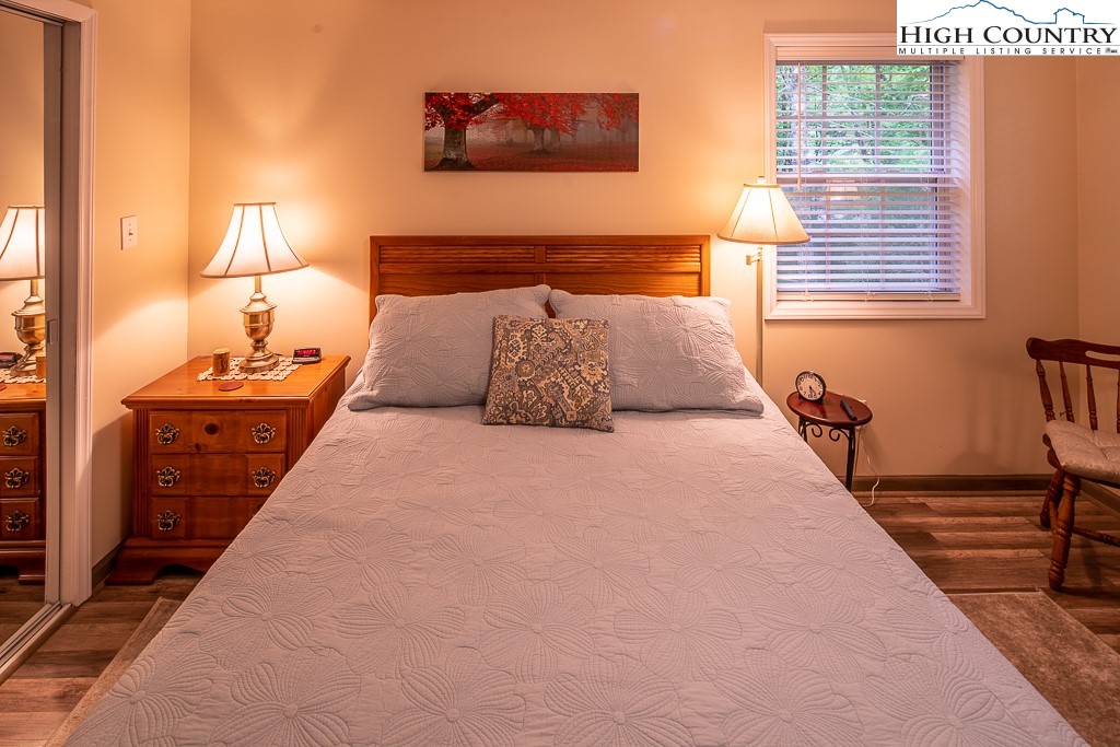 10 Overlook Road Newland, NC 28657 - Photo 22 of 50 a bedroom with a bed and a night stand