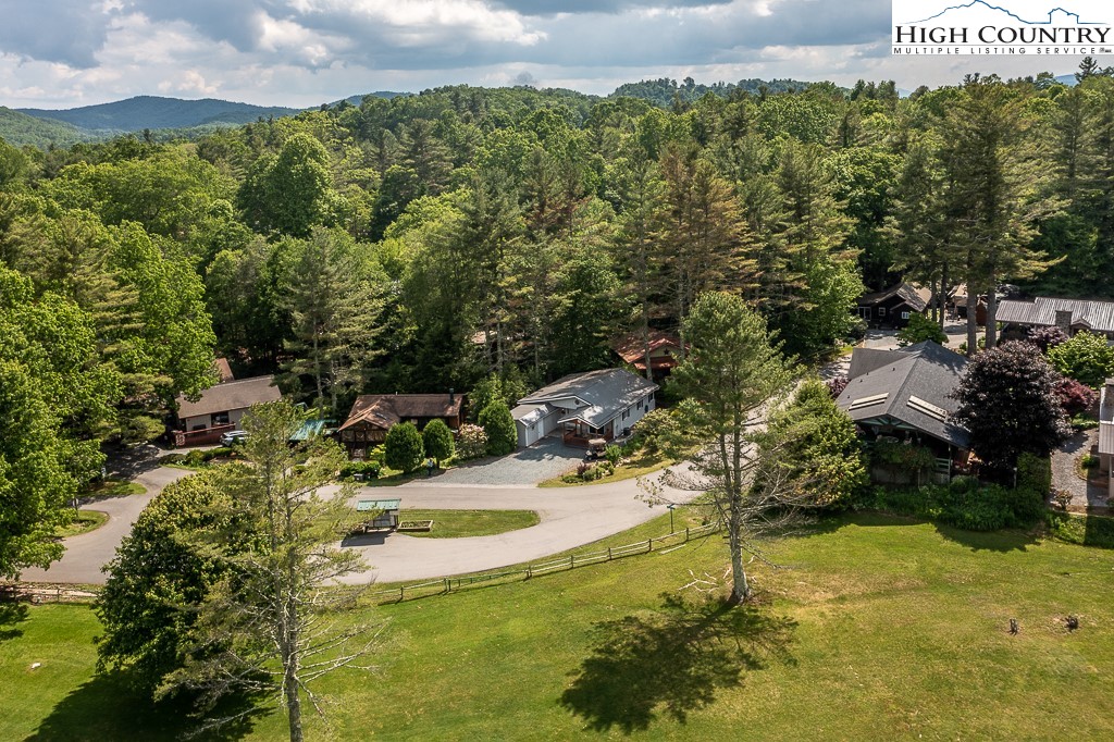 10 Overlook Road Newland, NC 28657 - Photo 42 of 50 a view of a house with a yard and lake