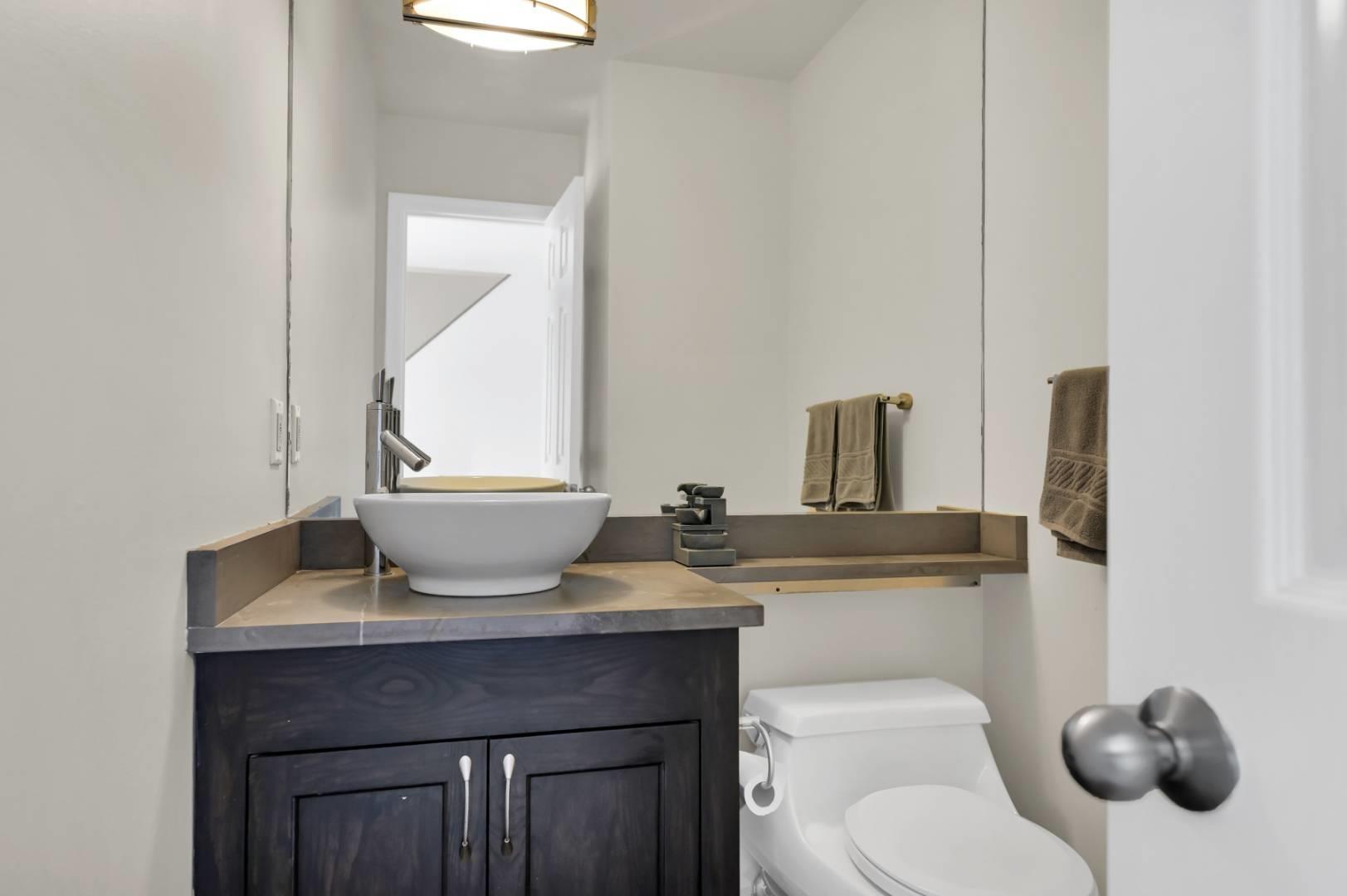 26 Lakeside Lane Westhampton, NY 11977 - Photo 14 of 24 a bathroom with a toilet and a sink