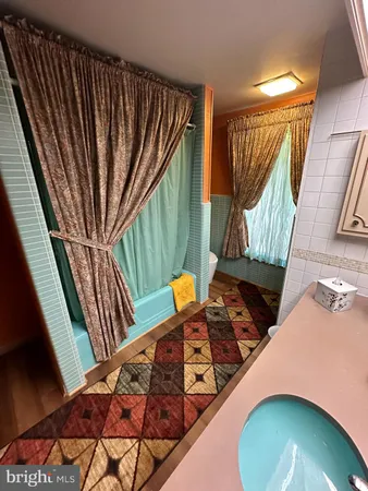 a view of a balcony with chairs