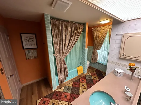 a kitchen with a sink stove and refrigerator