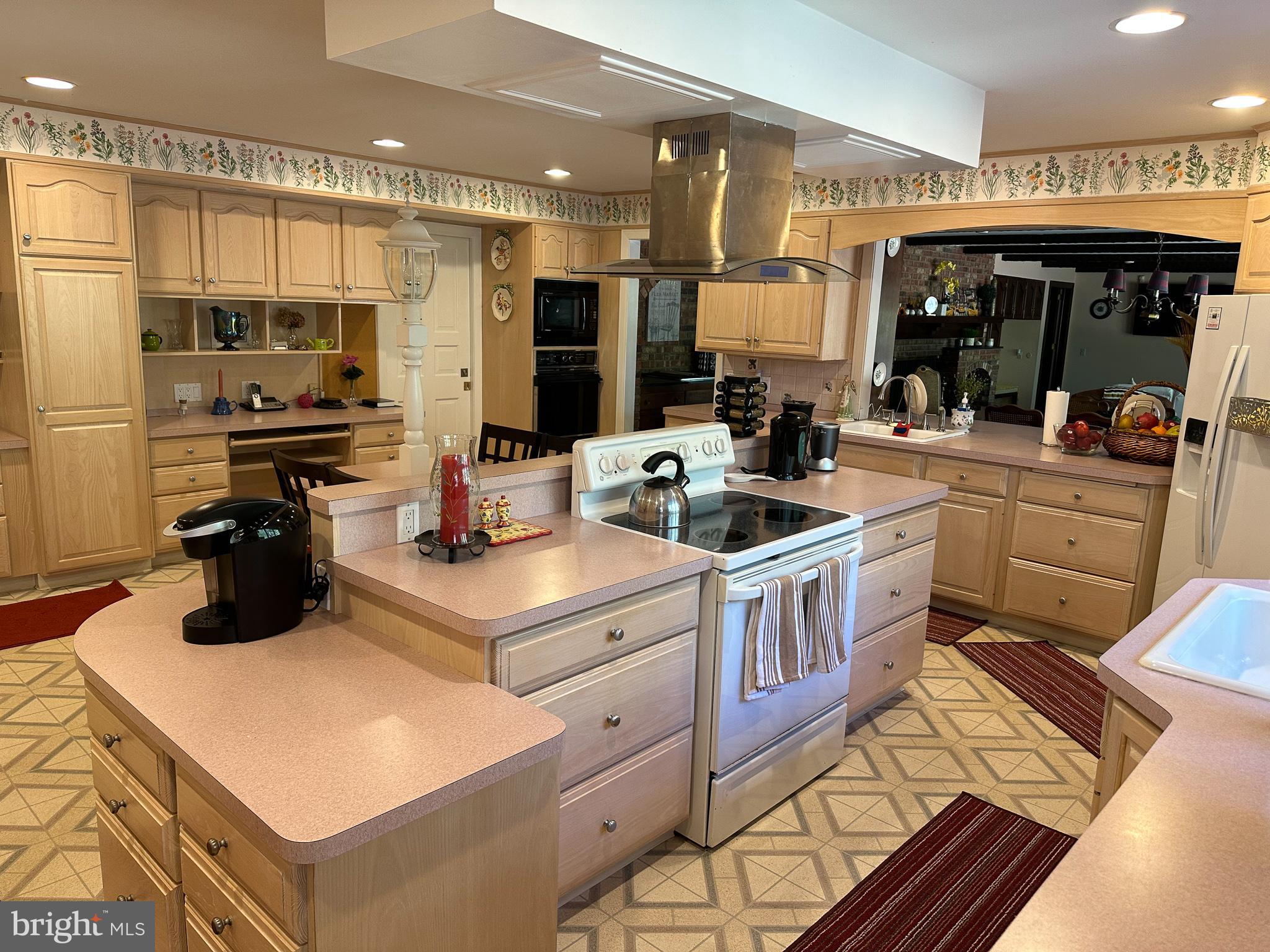 600 Glenside Road Millville, NJ 08332 - Photo 24 of 61 a kitchen with a stove a sink and a refrigerator