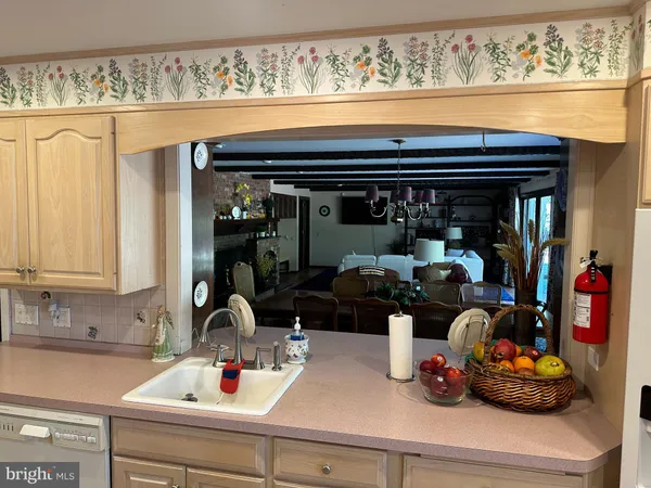 a bedroom with bed and a window