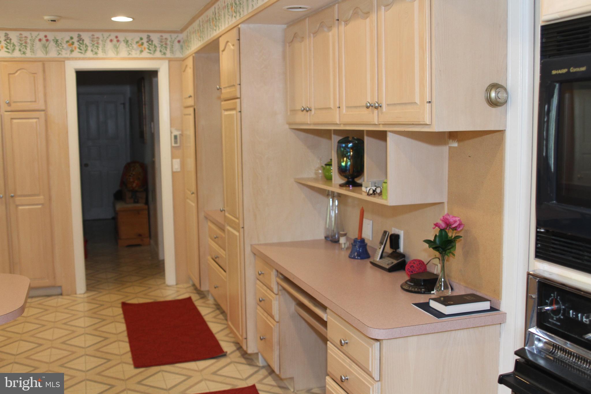 600 Glenside Road Millville, NJ 08332 - Photo 37 of 61 a kitchen with sink refrigerator and cabinets