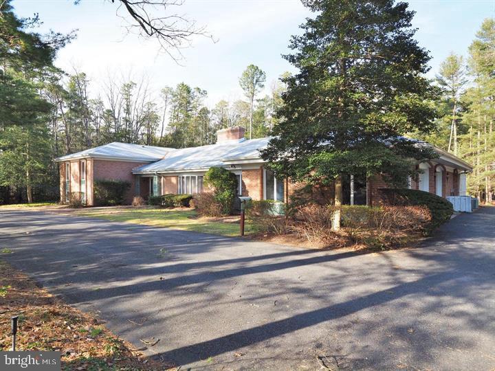 600 Glenside Road Millville, NJ 08332 - Photo 48 of 61 a front view of a house with a yard table and chairs