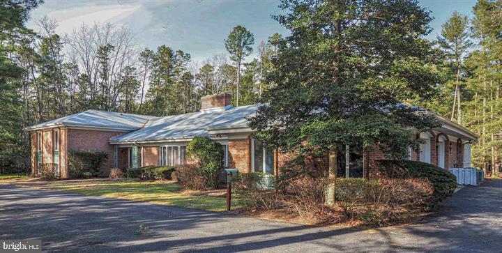 600 Glenside Road Millville, NJ 08332 - Photo 49 of 61 a front view of a house with garden