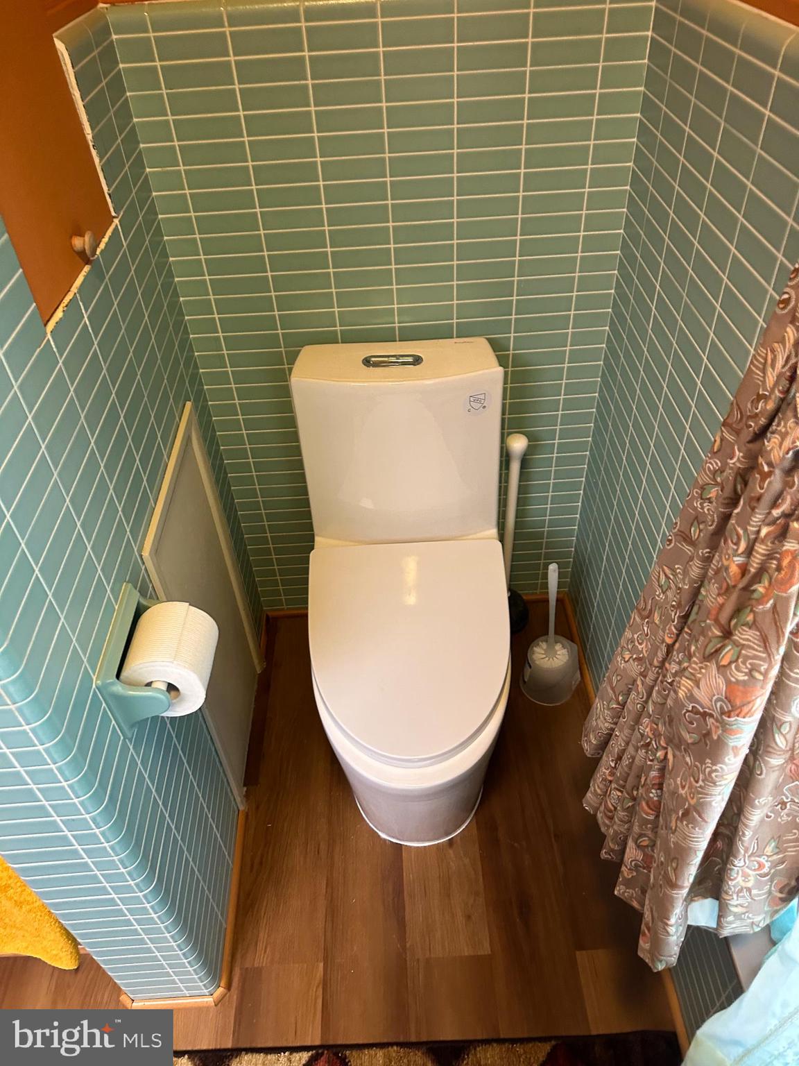600 Glenside Road Millville, NJ 08332 - Photo 9 of 61 a bathroom with a toilet and a sink