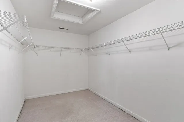 a view of a room with racks on the wall