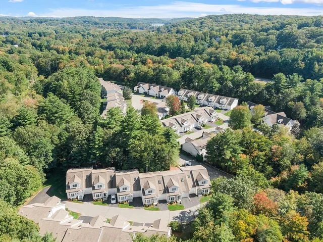 an aerial view of a house with a garden view