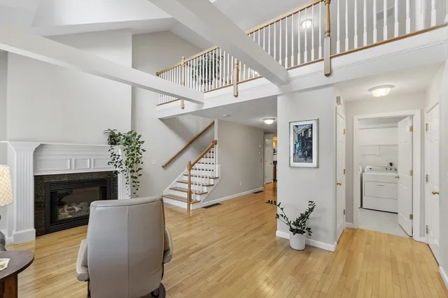 a bedroom with furniture and a fireplace