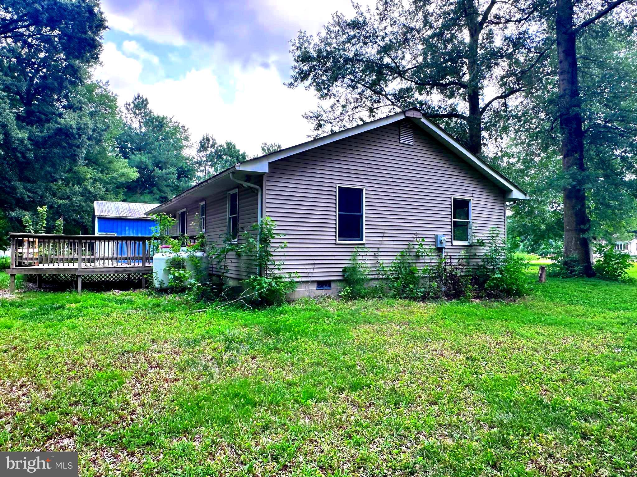 8027 Willow Grove Road Camden Wyoming, DE 19934 - Photo 5 of 16 a house view with a garden space
